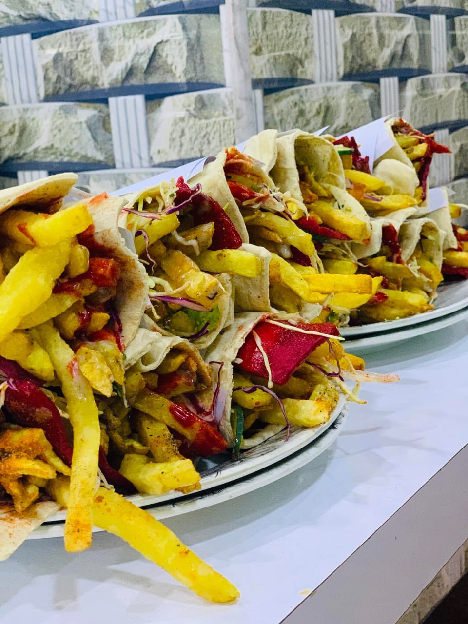 Fresh Afghani shawarma plates prepared at the shop